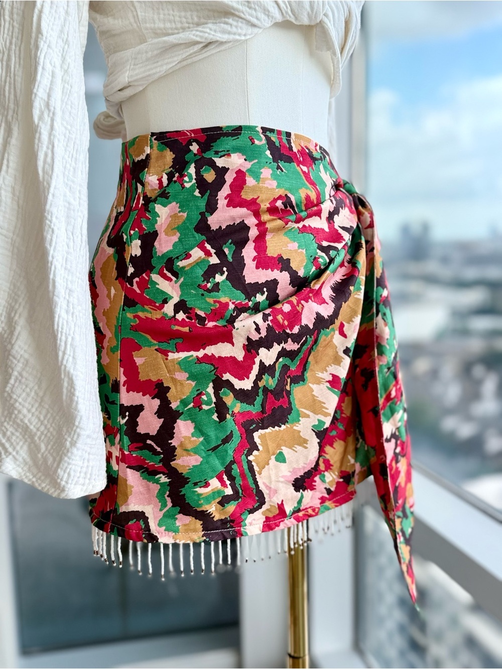 Micas Abstract Print Wrap Mini Skirt with Beaded Fringe Hem — Size M - Picture 1 of 5